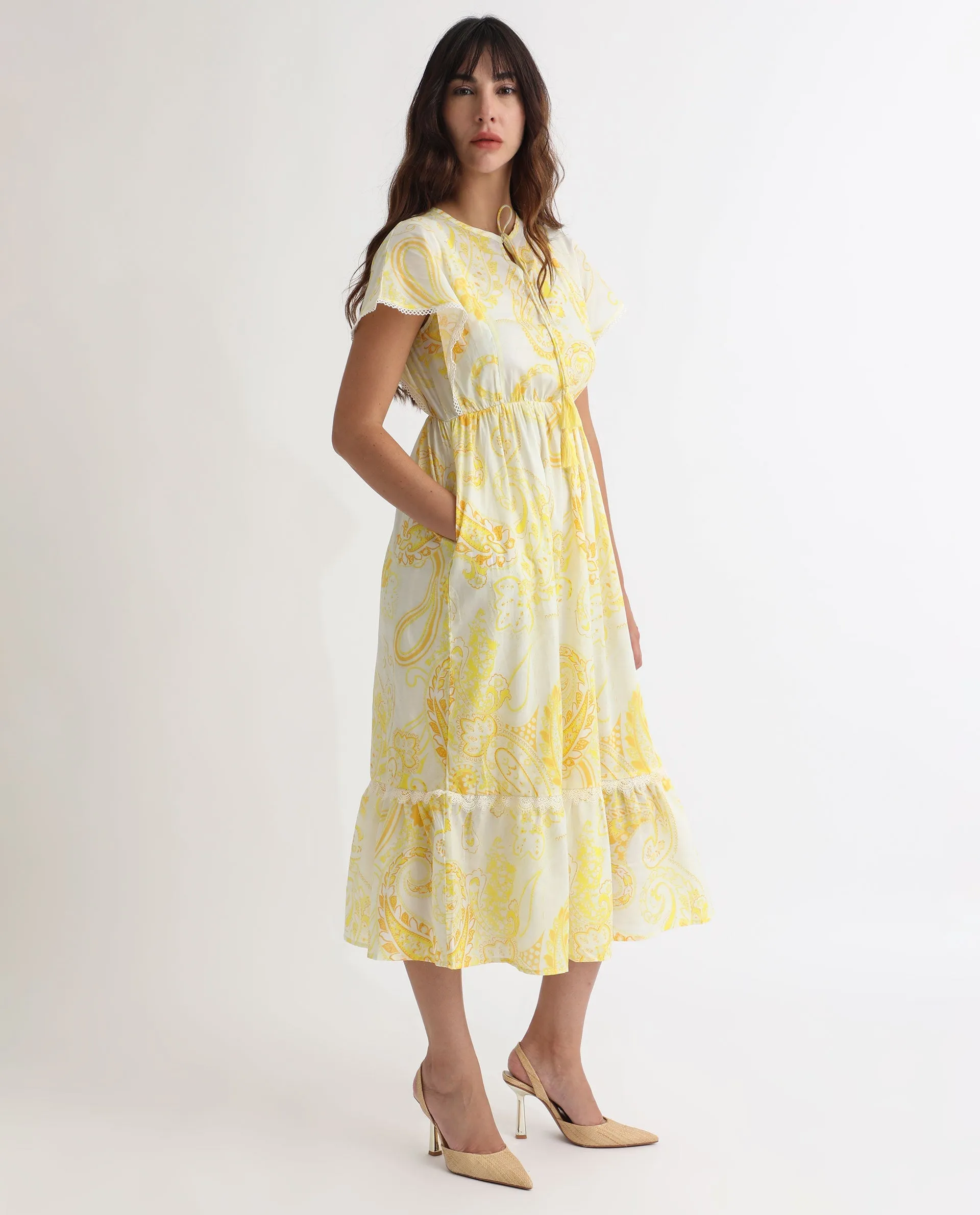 Rareism Women Lammer Light Yellow Cotton Fabric Short Sleeves Tie-Up Closure Tie-Up Neck Extended Sleeve Relaxed Fit Paisley Print Maxi Tiered Dress