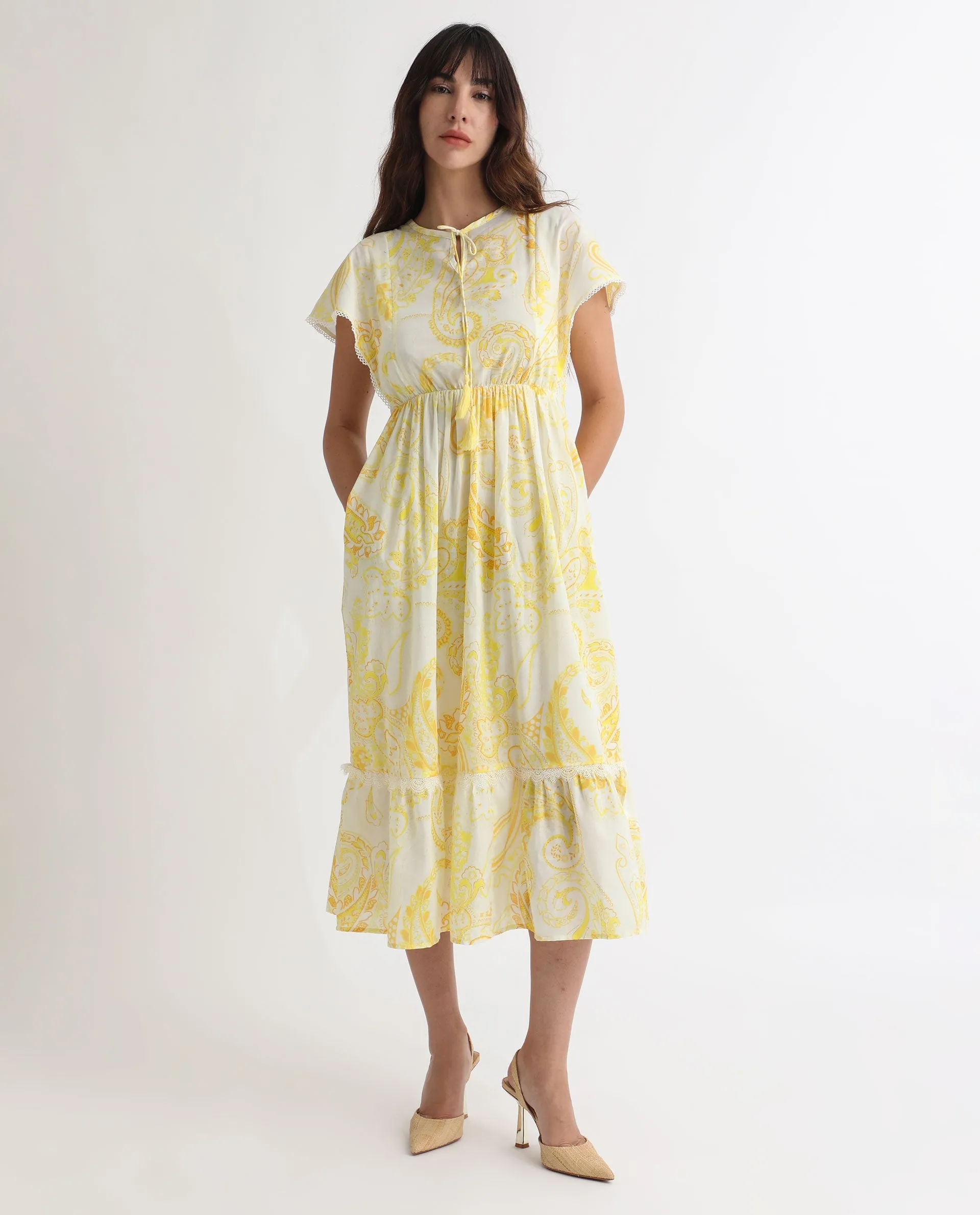 Rareism Women Lammer Light Yellow Cotton Fabric Short Sleeves Tie-Up Closure Tie-Up Neck Extended Sleeve Relaxed Fit Paisley Print Maxi Tiered Dress