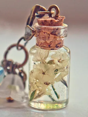 Real yellow dried flowers in resin vial necklace